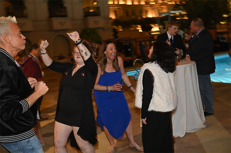 attendees dancing at the conference ball room